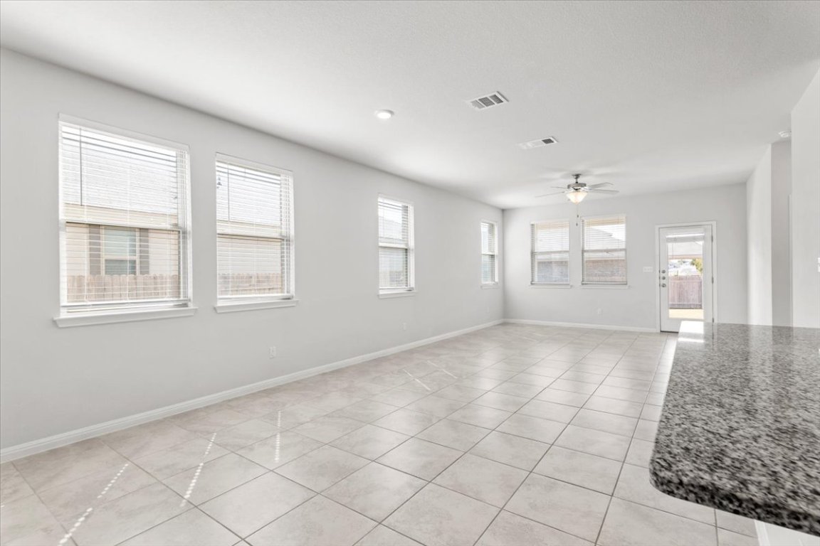 105 Otella Street Georgetown, TX 78628 - Photo 11 of 31 a view of an empty room with a window
