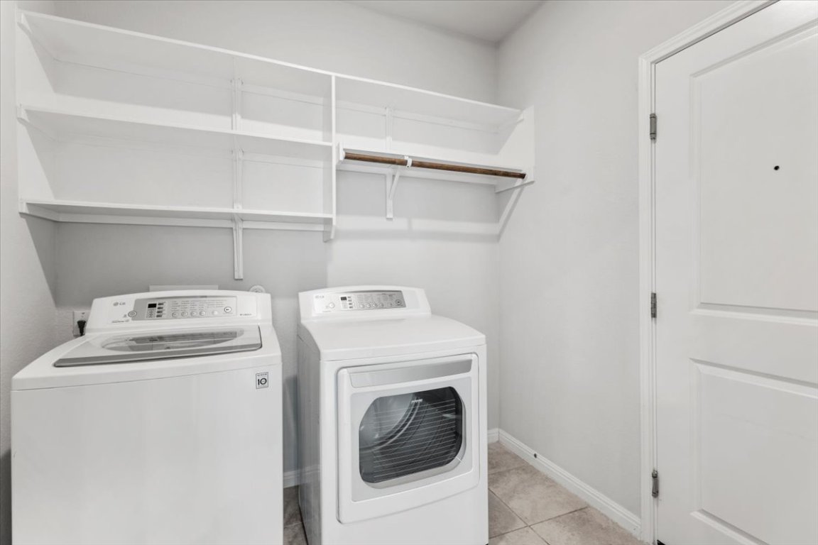 105 Otella Street Georgetown, TX 78628 - Photo 28 of 31 a utility room with dryer and washer