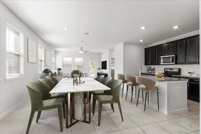 a view of a dining room with furniture