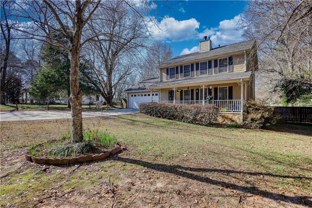 12510 Highway 36 Covington, GA 30014 - Photo 2 of 31 a view of a house with backyard and sitting area