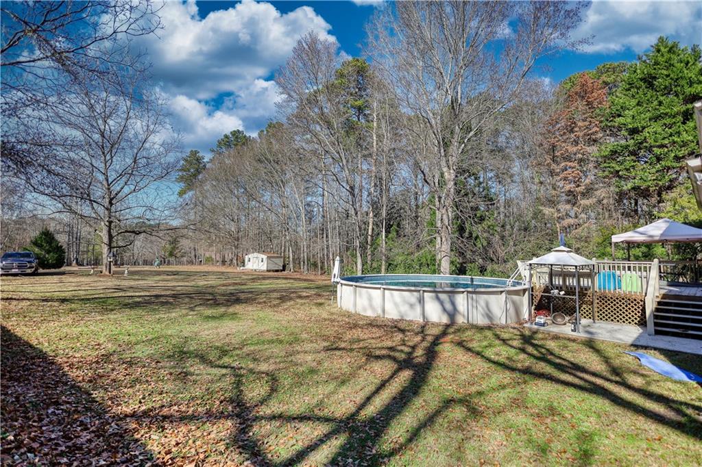 12510 Highway 36 Covington, GA 30014 - Photo 23 of 31 a view of a swimming pool with a patio
