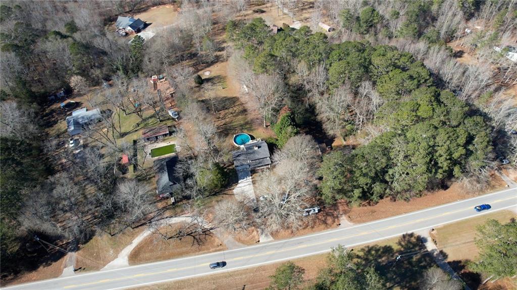 12510 Highway 36 Covington, GA 30014 - Photo 30 of 31 an aerial view of a house with a yard and large tree