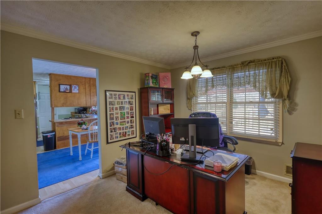 12510 Highway 36 Covington, GA 30014 - Photo 7 of 31 a workspace with furniture window and wooden floor