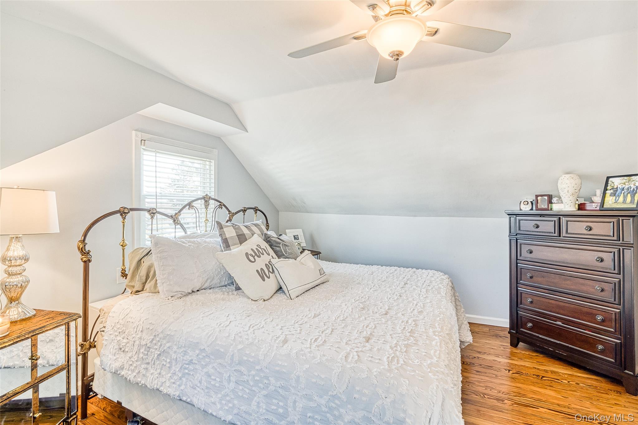 210 11th Street West Babylon, NY 11704 - Photo 21 of 36 a bedroom with a bed and a dresser