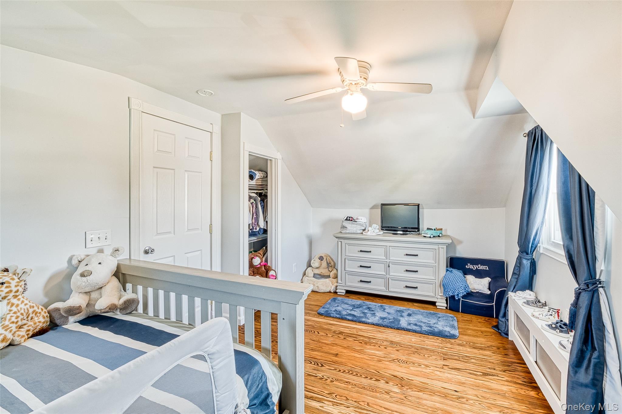 210 11th Street West Babylon, NY 11704 - Photo 27 of 36 a bedroom with furniture and a window