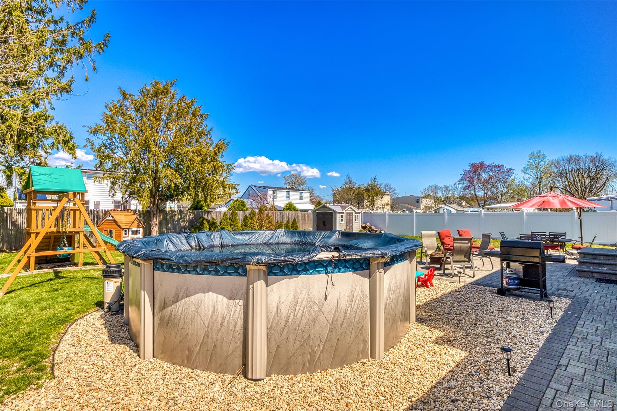 210 11th Street West Babylon, NY 11704 - Photo 33 of 36 a view of outdoor space with seating area