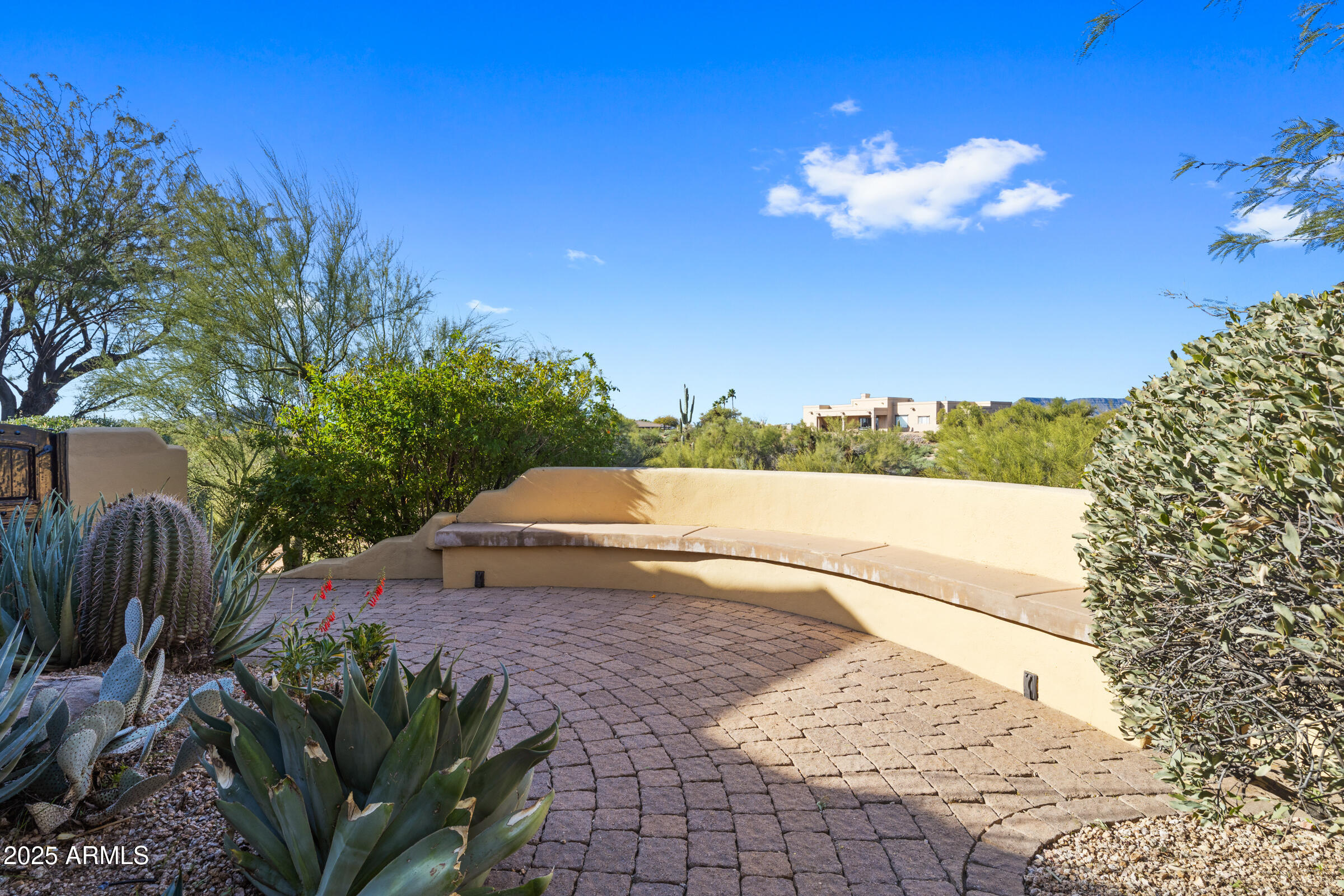 36663 Wild Flower Road Carefree, AZ 85377 - Photo 12 of 79 a view of a terrace with a garden