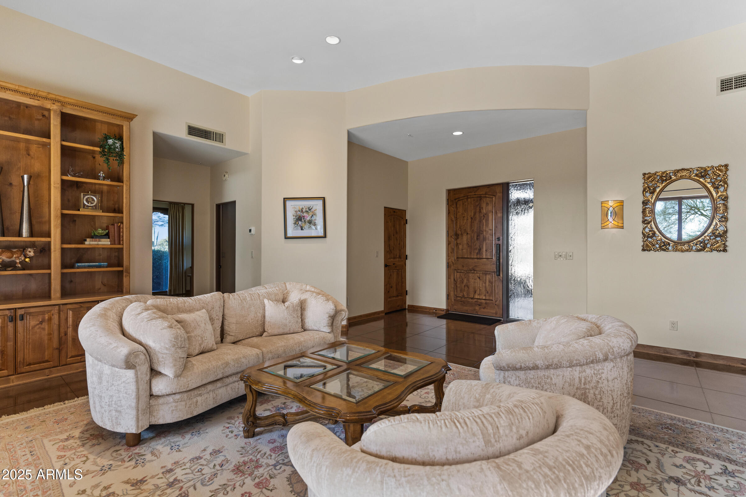 36663 Wild Flower Road Carefree, AZ 85377 - Photo 16 of 79 a living room with furniture and a large window