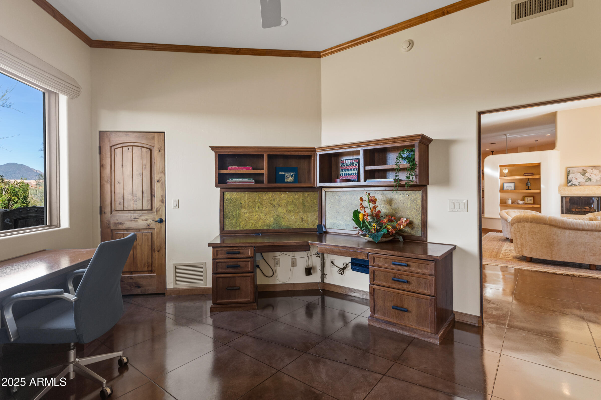 36663 Wild Flower Road Carefree, AZ 85377 - Photo 42 of 79 a living room with furniture and a flat screen tv