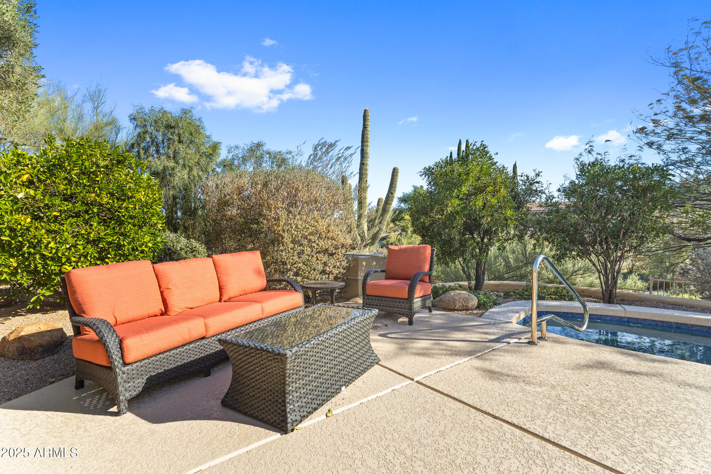 36663 Wild Flower Road Carefree, AZ 85377 - Photo 60 of 79 a outdoor living space with furniture and city view