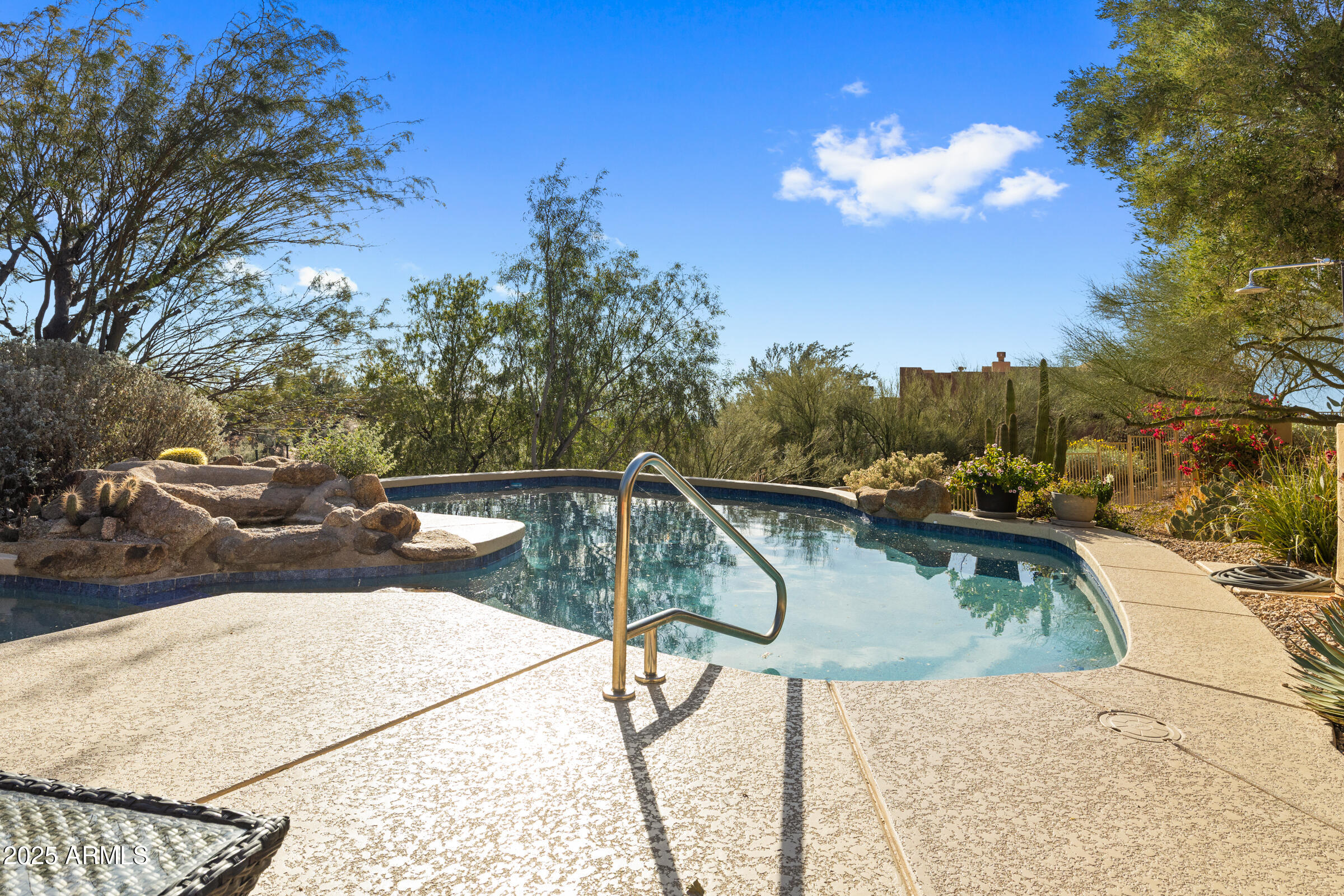 36663 Wild Flower Road Carefree, AZ 85377 - Photo 61 of 79 a view of a terrace with furniture and a potted plant