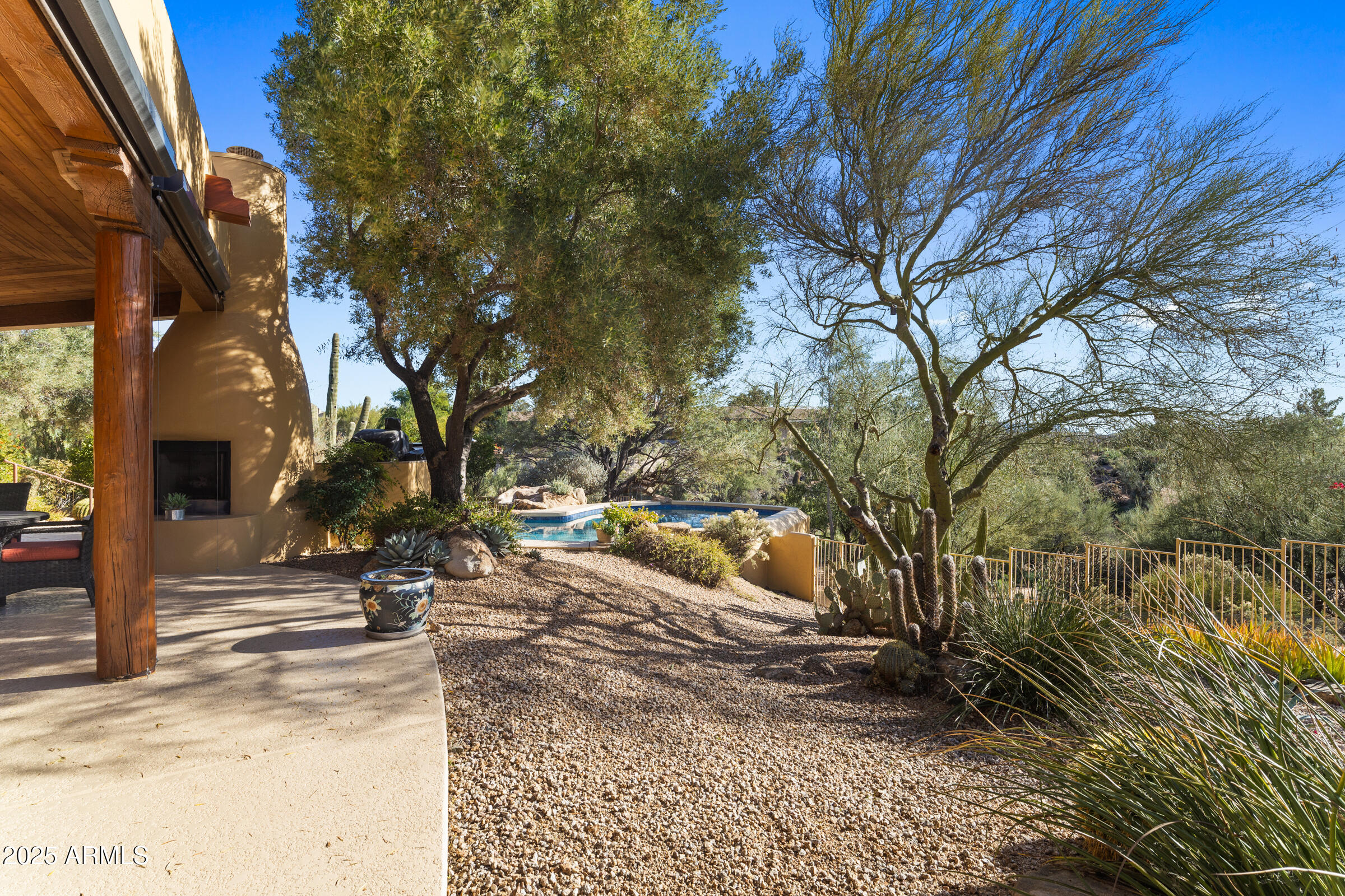 36663 Wild Flower Road Carefree, AZ 85377 - Photo 64 of 79 a view of a yard with plants and trees
