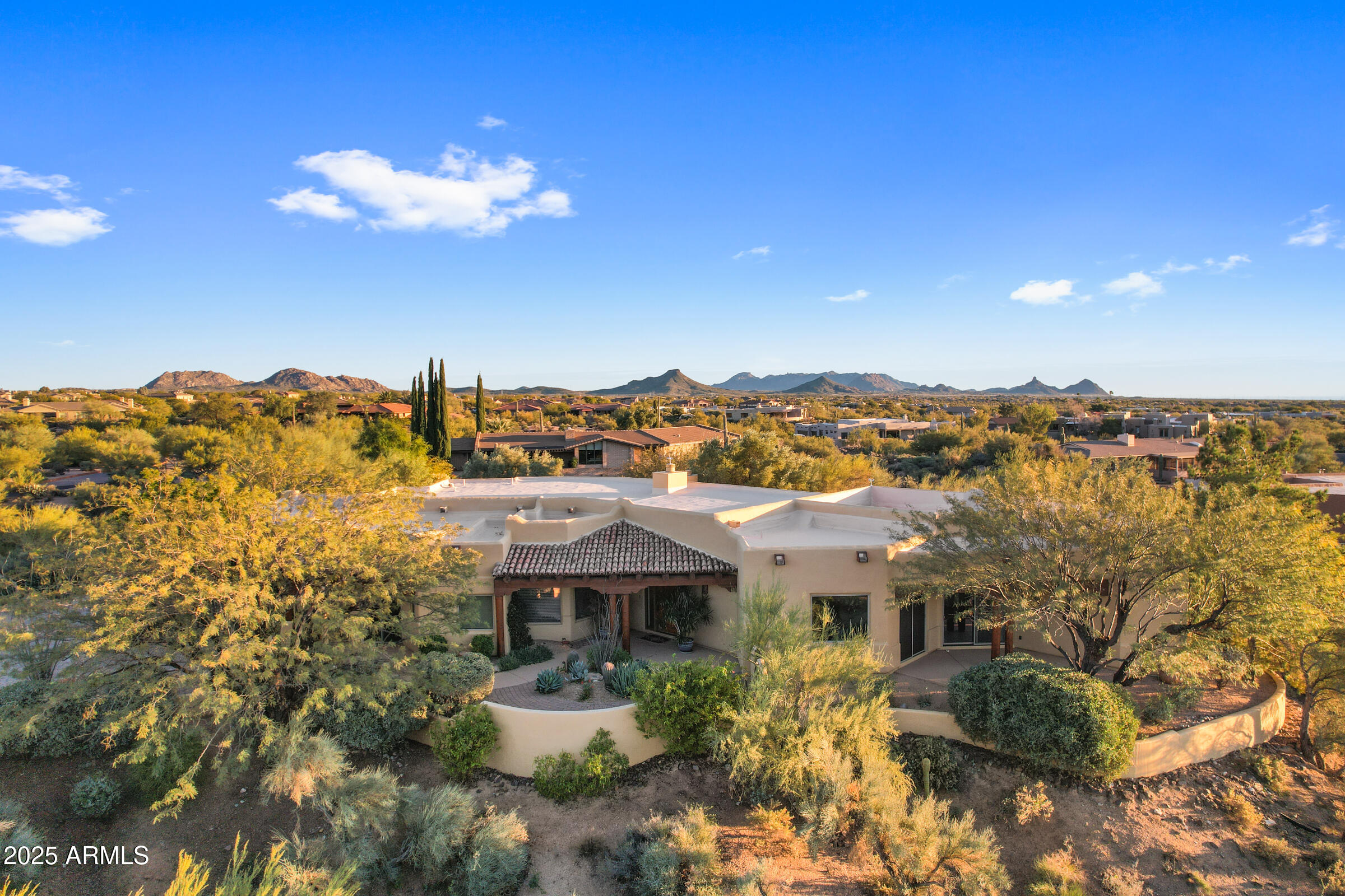 36663 Wild Flower Road Carefree, AZ 85377 - Photo 71 of 79 a view of a house with a garden
