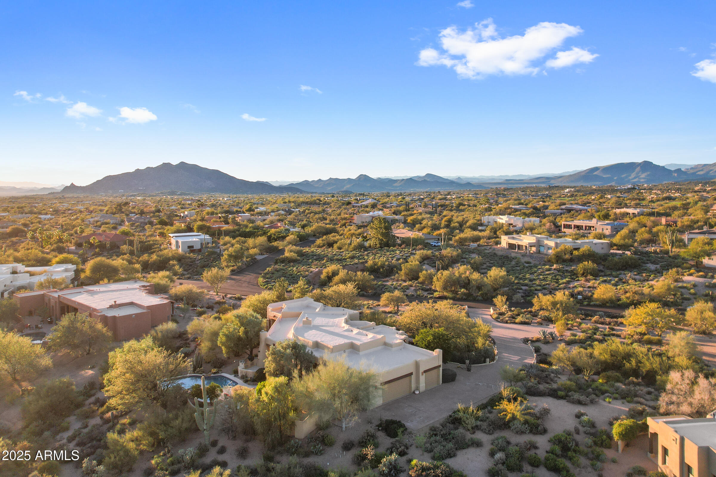 36663 Wild Flower Road Carefree, AZ 85377 - Photo 73 of 79 an aerial view of residential houses with outdoor space and trees