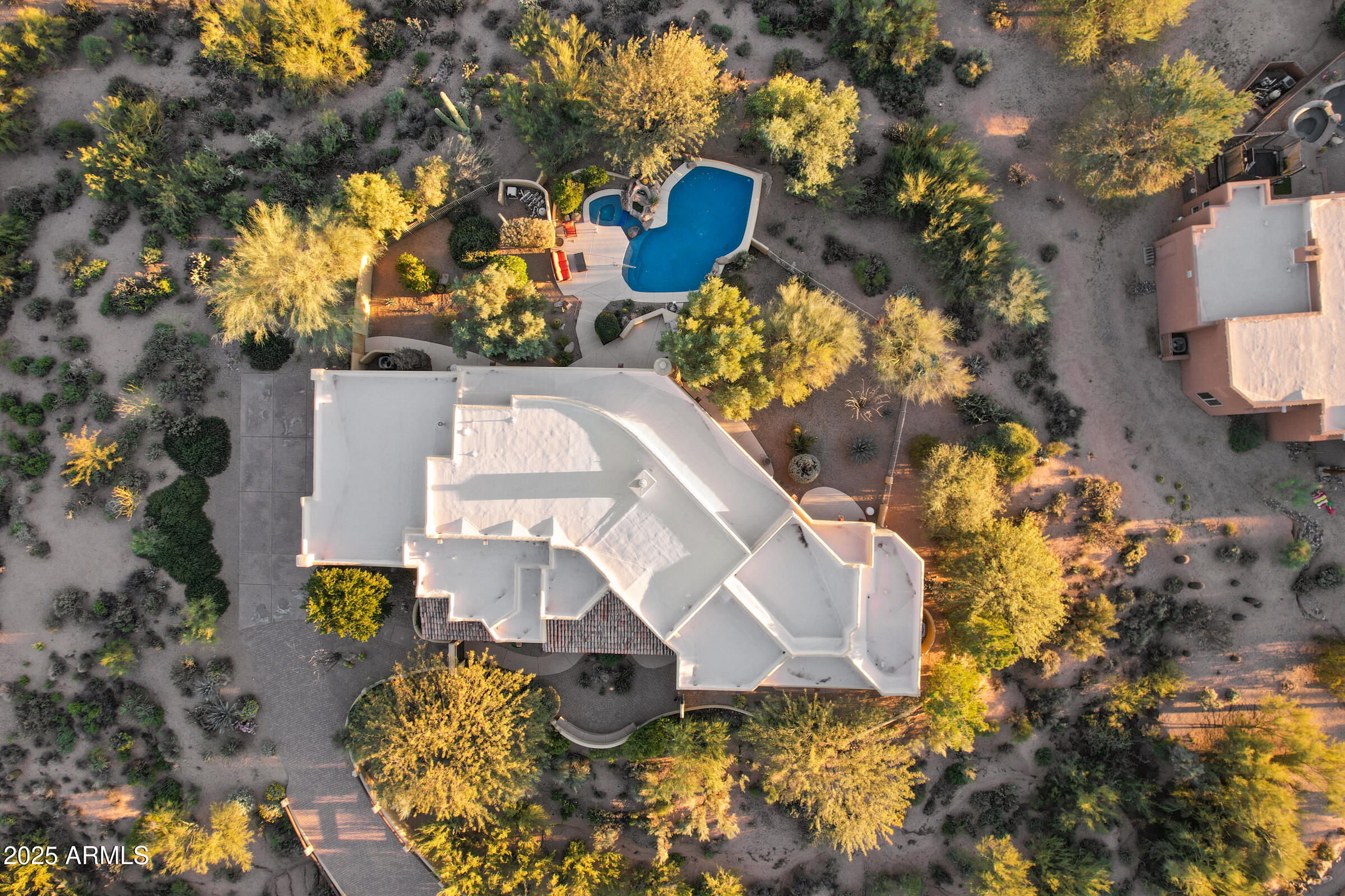 36663 Wild Flower Road Carefree, AZ 85377 - Photo 76 of 79 a view of a house with a yard and sitting area