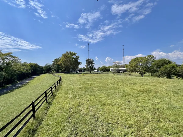 a house with yard in front of it