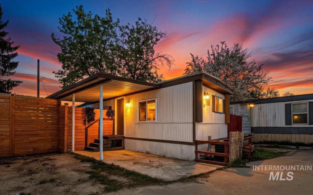 7701 West Ustick Road, Unit 14 Boise, ID 83704 - Photo 2 of 22 View of front of home featuring a patio area