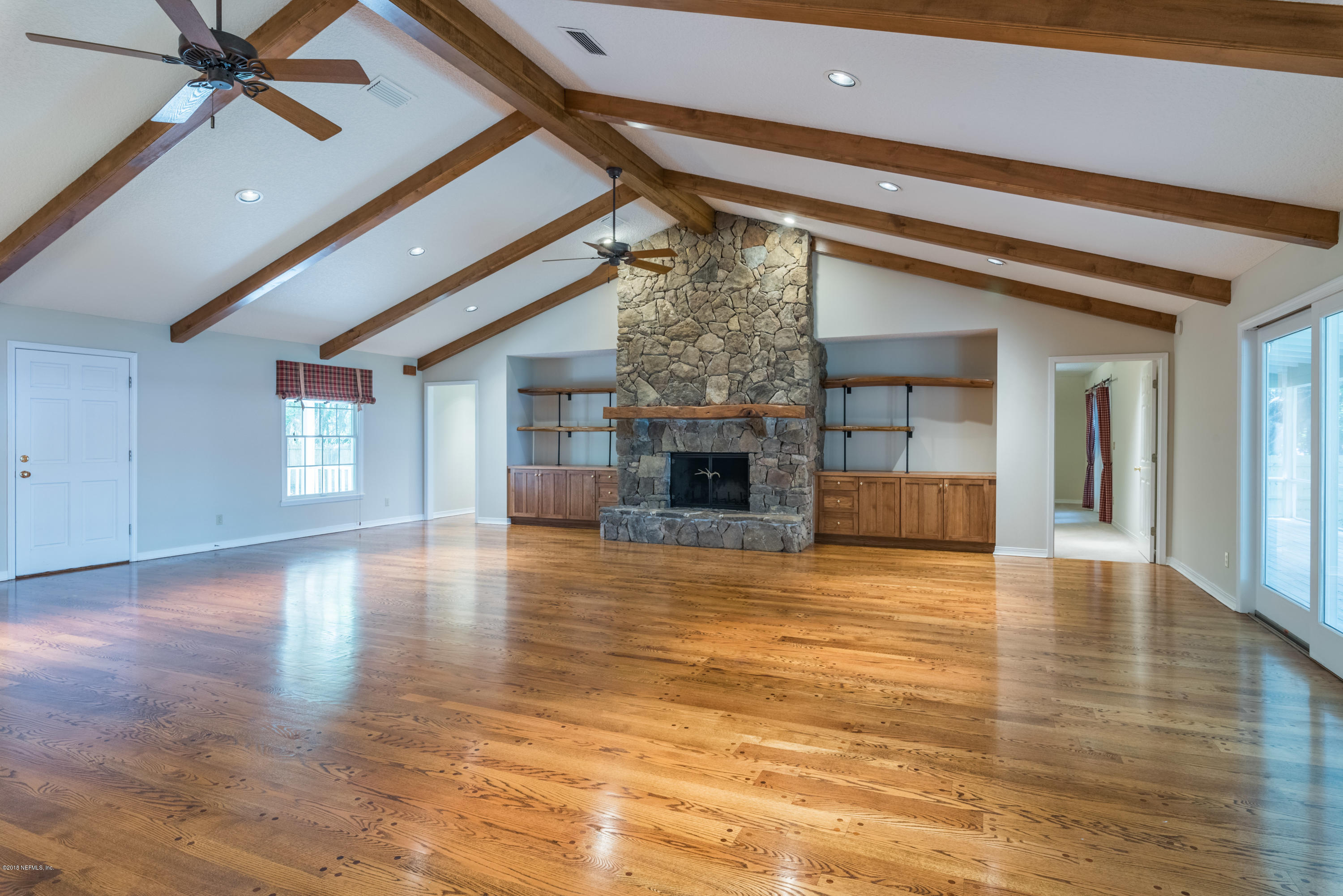 7867 Rusty Anchor Road St. Augustine, FL 32092 - Photo 16 of 36 a view of a livingroom with a fireplace