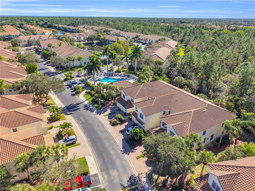 1435 Tiffany Lane, Unit 302 Naples, FL 34105 - Photo 32 of 36 an aerial view of a house with a garden