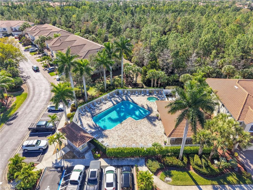 1435 Tiffany Lane, Unit 302 Naples, FL 34105 - Photo 35 of 36 an aerial view of a house having yard