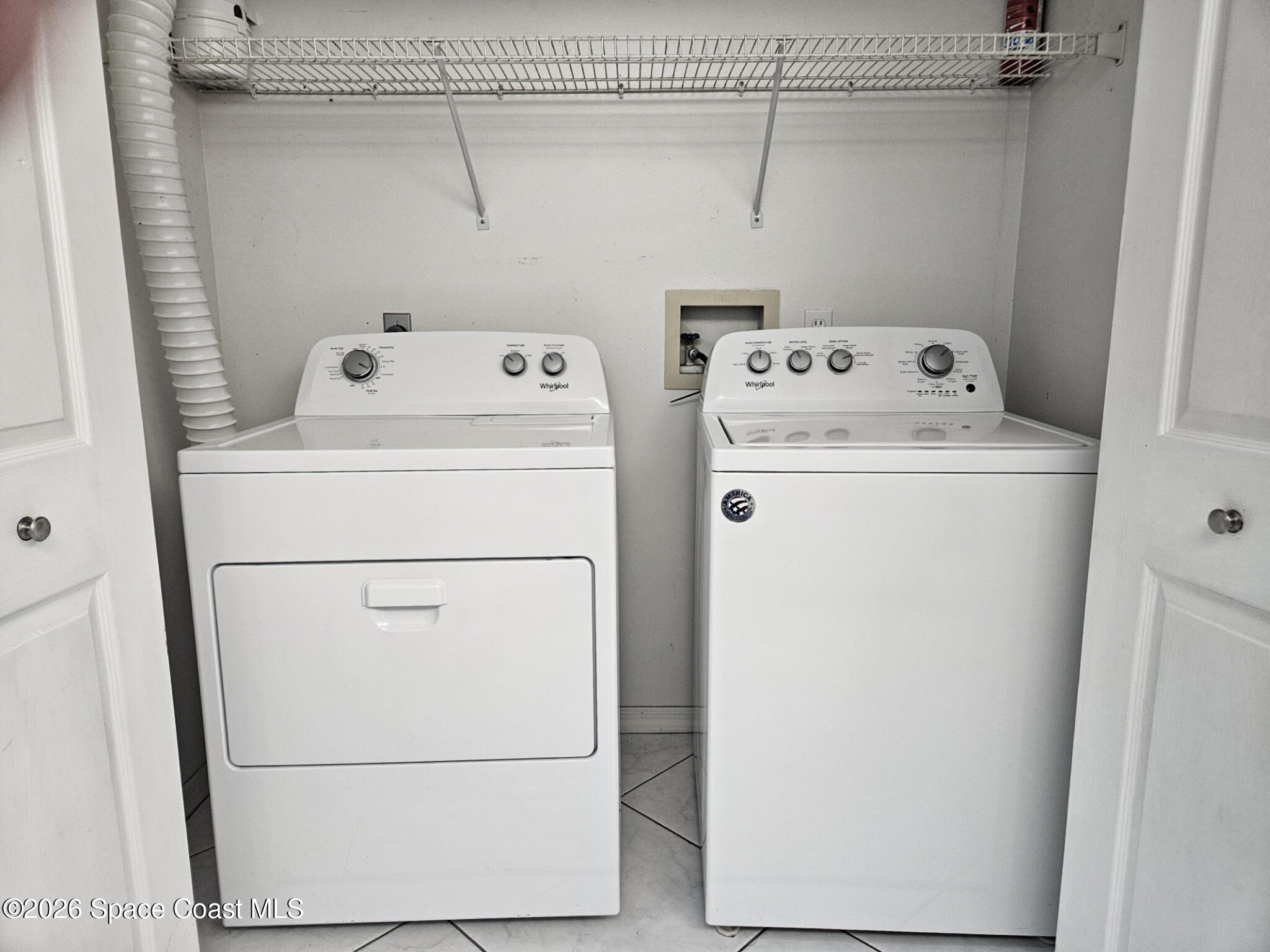 1921 Quail Ridge Court, Unit 2401 Cocoa, FL 32926 - Photo 11 of 18 Laundry