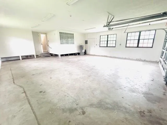 an empty room with windows