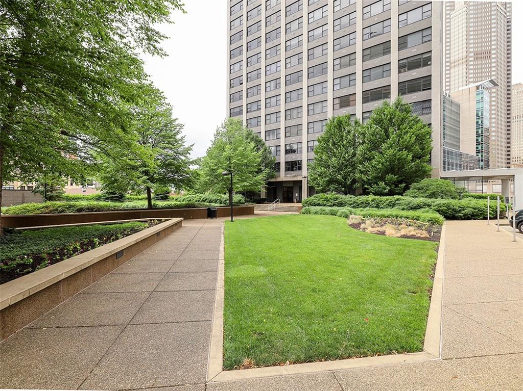 112 Washington Place, Unit 2F Pittsburgh, PA 15219 - Photo 23 of 30 a view of a garden with tall buildings