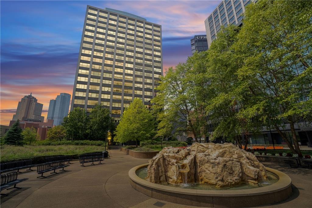 112 Washington Place, Unit 2F Pittsburgh, PA 15219 - Photo 30 of 30 a view of a swimming pool with a yard and plants