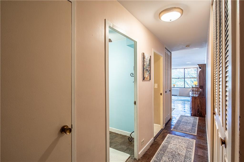112 Washington Place, Unit 2F Pittsburgh, PA 15219 - Photo 5 of 30 a bathroom with a glass door shower and a sink