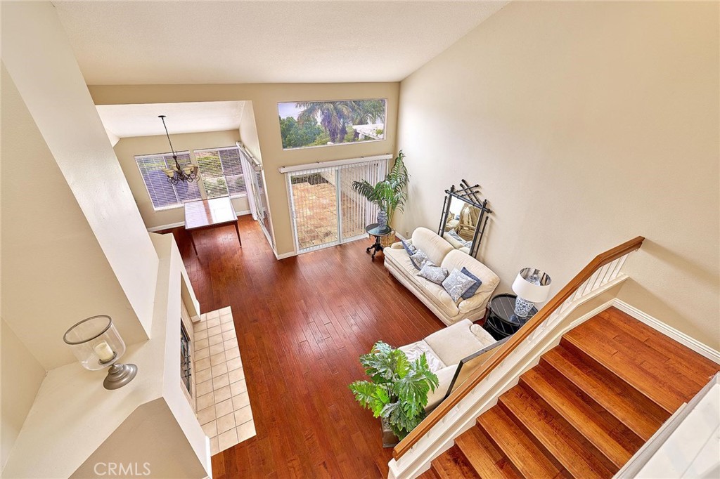 9 La Quinta Irvine, CA 92612 - Photo 18 of 39 a view of an entryway with wooden floor