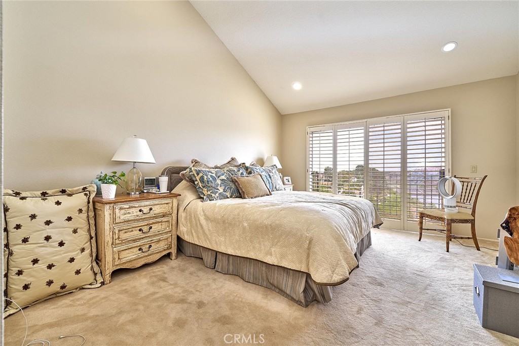 9 La Quinta Irvine, CA 92612 - Photo 19 of 39 a bedroom with bed and window