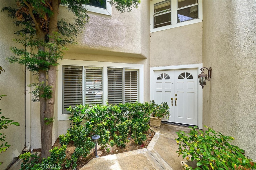 9 La Quinta Irvine, CA 92612 - Photo 3 of 39 a view of a house with potted plants