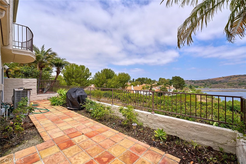 9 La Quinta Irvine, CA 92612 - Photo 36 of 39 a view of a lake with a garden