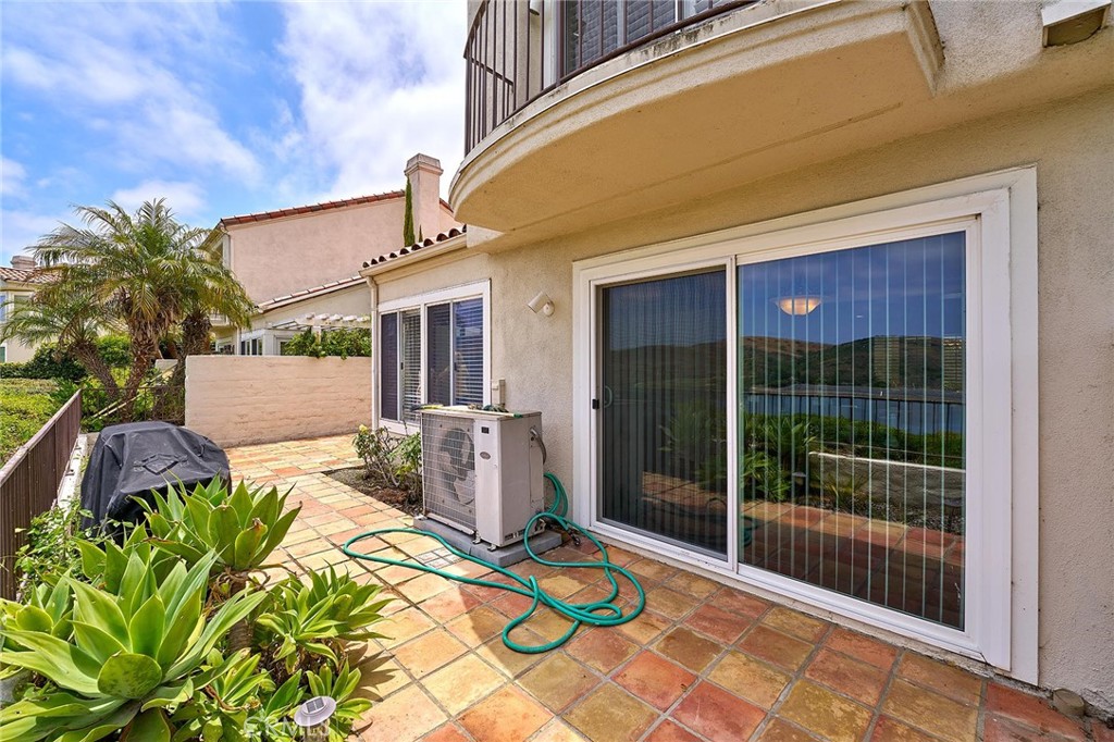 9 La Quinta Irvine, CA 92612 - Photo 37 of 39 a front view of a house with garden