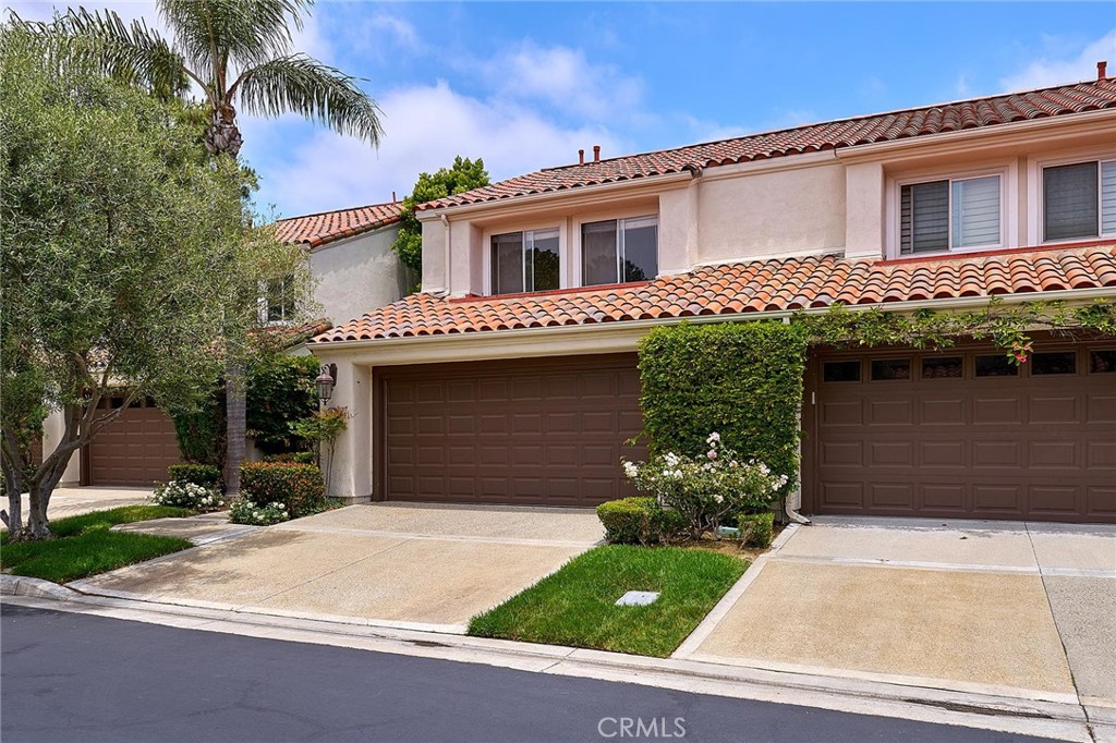 9 La Quinta Irvine, CA 92612 - Photo 39 of 39 a front view of a house with garden