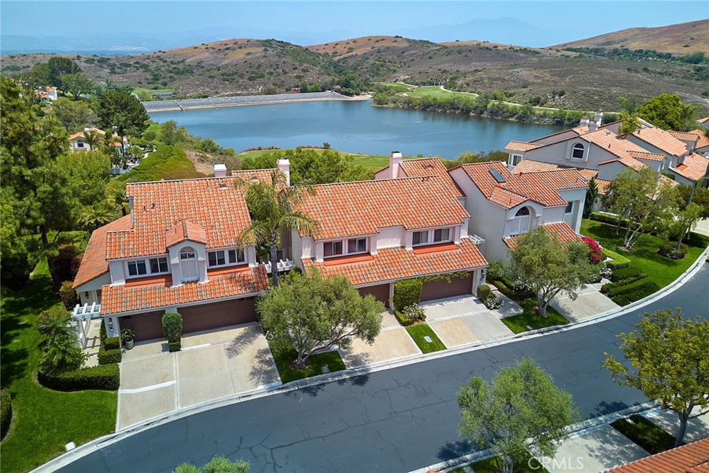 9 La Quinta Irvine, CA 92612 - Photo 5 of 39 an aerial view of residential houses with outdoor space and river