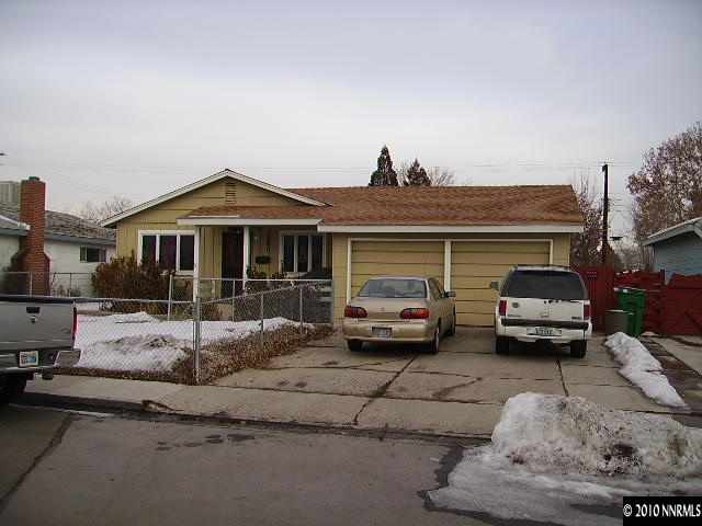 1640 Auburn Way Reno, NV 89502 - Photo 1 of 3 a car parked in front of a house