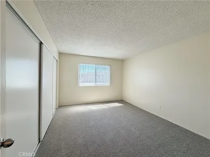 a bathroom with a toilet and a bathtub