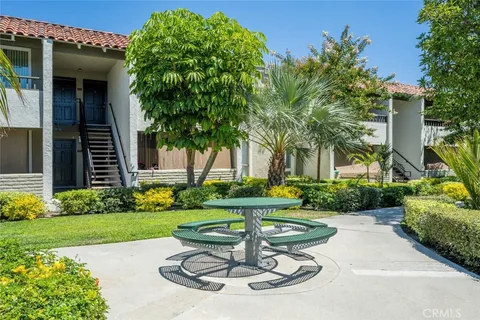 a house view with a garden space