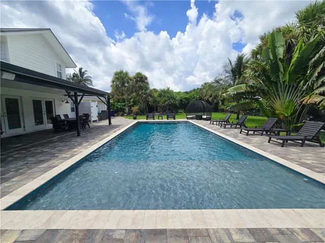 a view of a house with a park