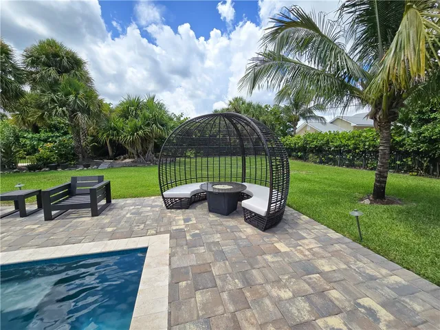 a garden view with a sitting space and garden