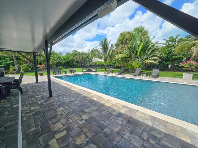 a view of a backyard with plants