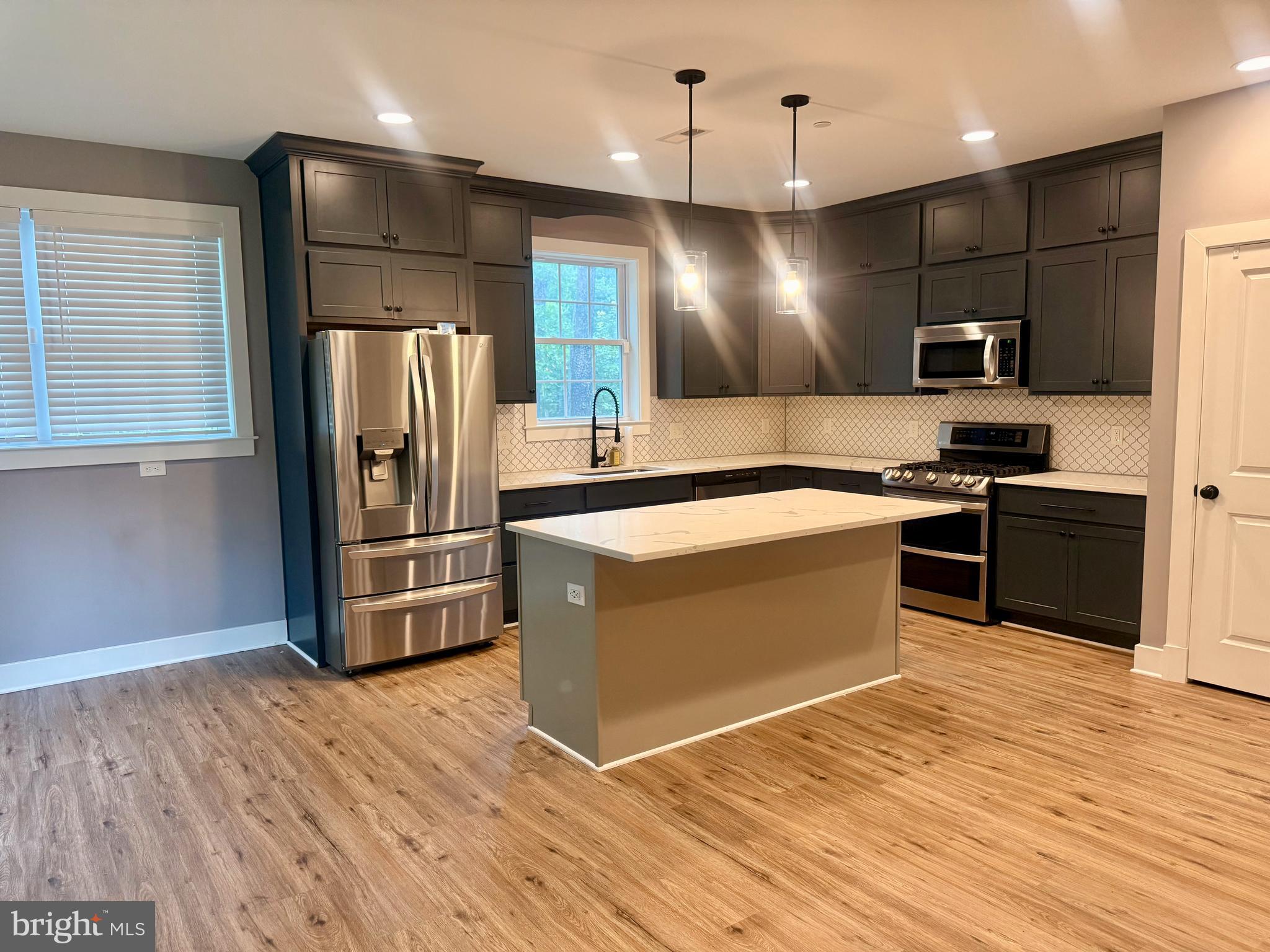 1921 Montevideo Road Jessup, MD 20794 - Photo 9 of 48 SS APPLIANCES, GAS COOKING, & CUSTOM BACKSPLASH