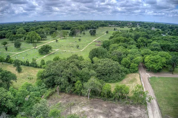a view of a lush green field