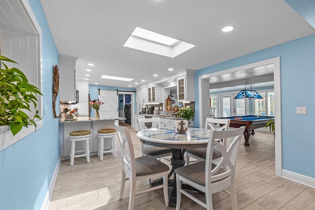 4387 6th Isle Drive Hernando Beach, FL 34607 - Photo 16 of 98 a dining room with furniture and window