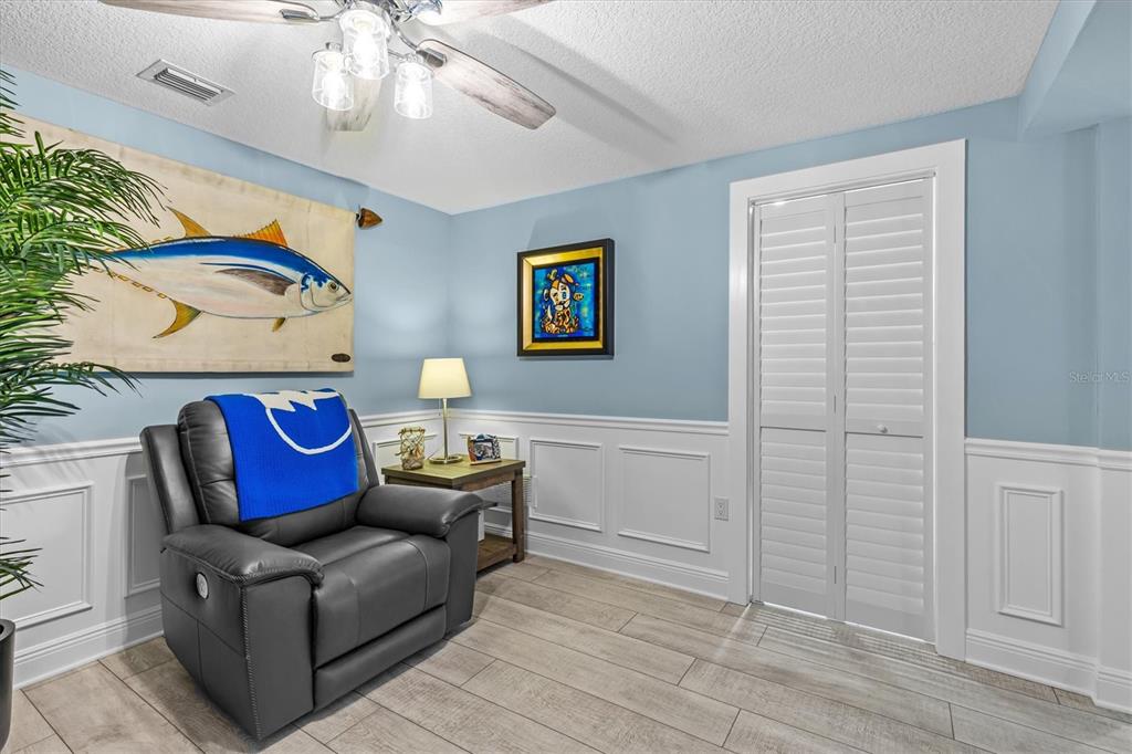 4387 6th Isle Drive Hernando Beach, FL 34607 - Photo 38 of 89 a living room with furniture and a window