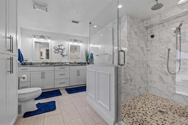 a view of a chairs and table in the patio