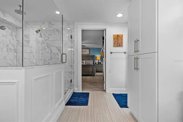 a view of a balcony with two chairs