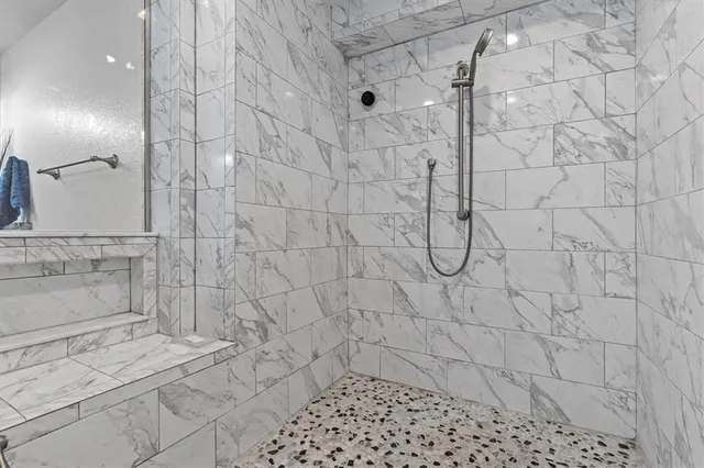 a view of a terrace with seating area and barbeque oven