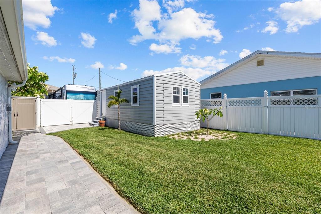 4387 6th Isle Drive Hernando Beach, FL 34607 - Photo 65 of 98 a view of a backyard of the house